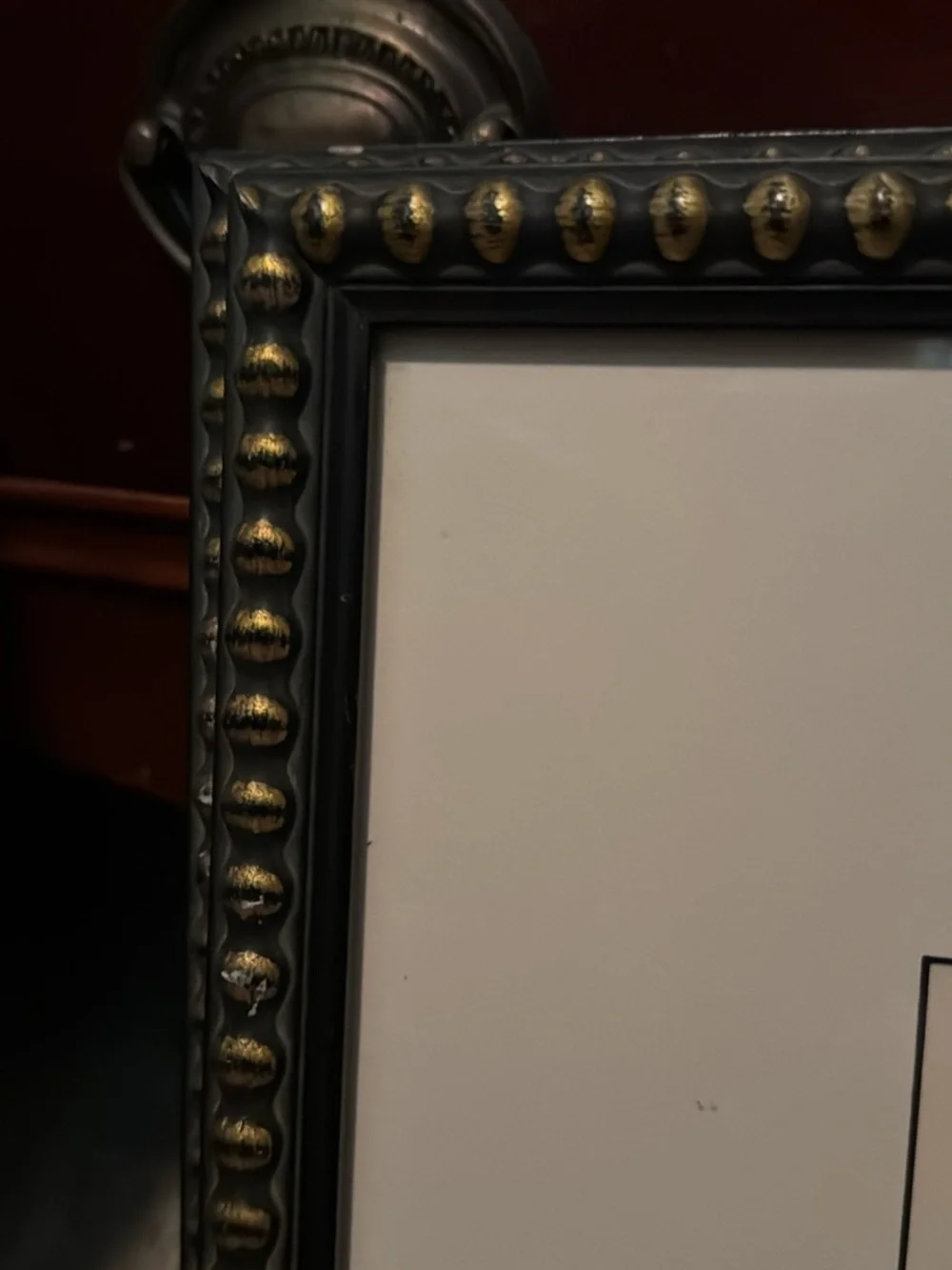 Locomotive matted print in black decorative frame with brass stud look accents